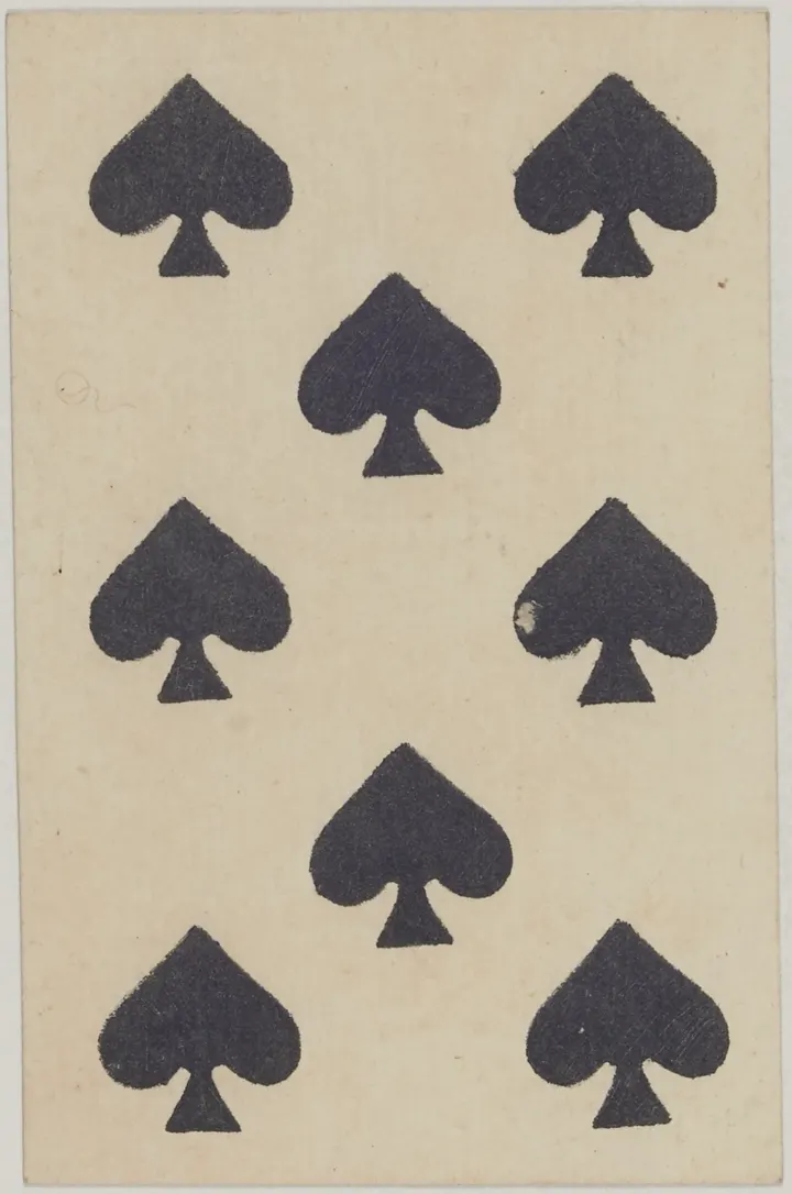 A French eight of spades from 1816, with eight black pike marks on a cream card.