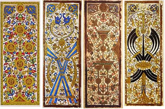 Four long painted cards from Egypt showing coins, crossed polo sticks, cups, and swords, with no people on them.